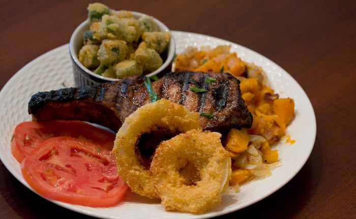 Pork Loin Chop with Sweet Potato Hash Browns and Onion Rings